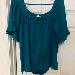 Maurice’s turquoise top